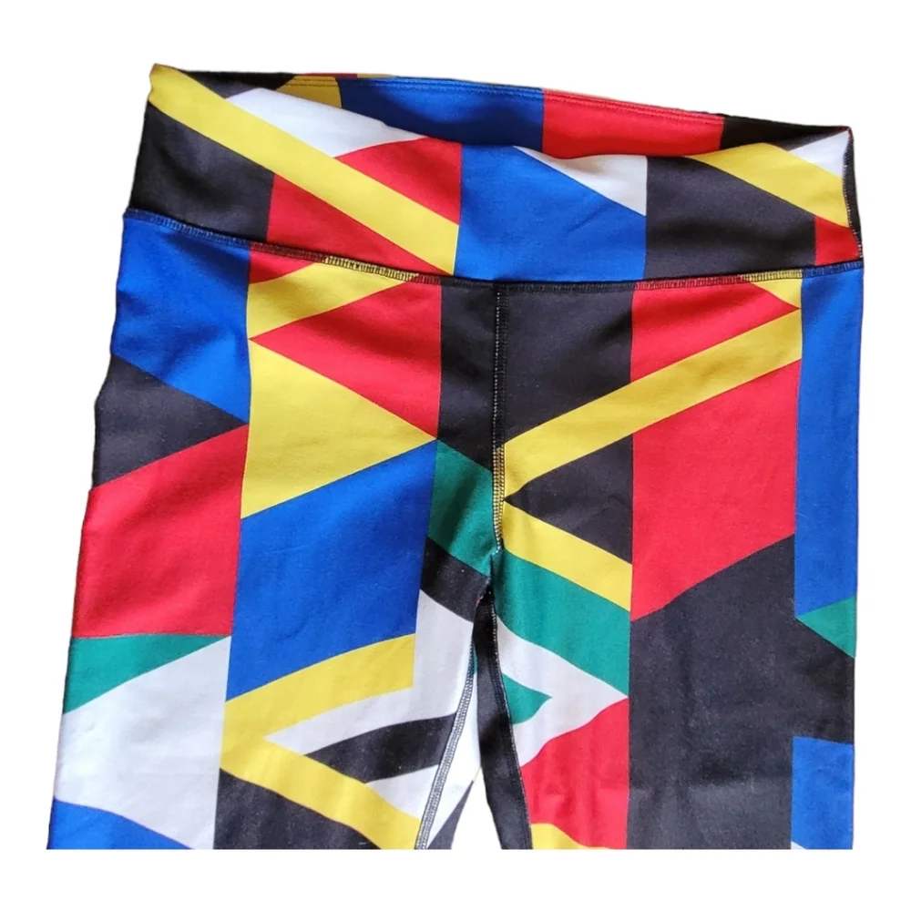 Fabletics Define Power Hold Mid Rise Capri Global Print Bold Colored Leggings M